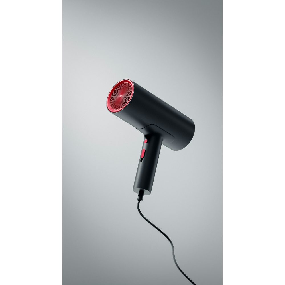 Handheld hair dryer with concentrator nozzle